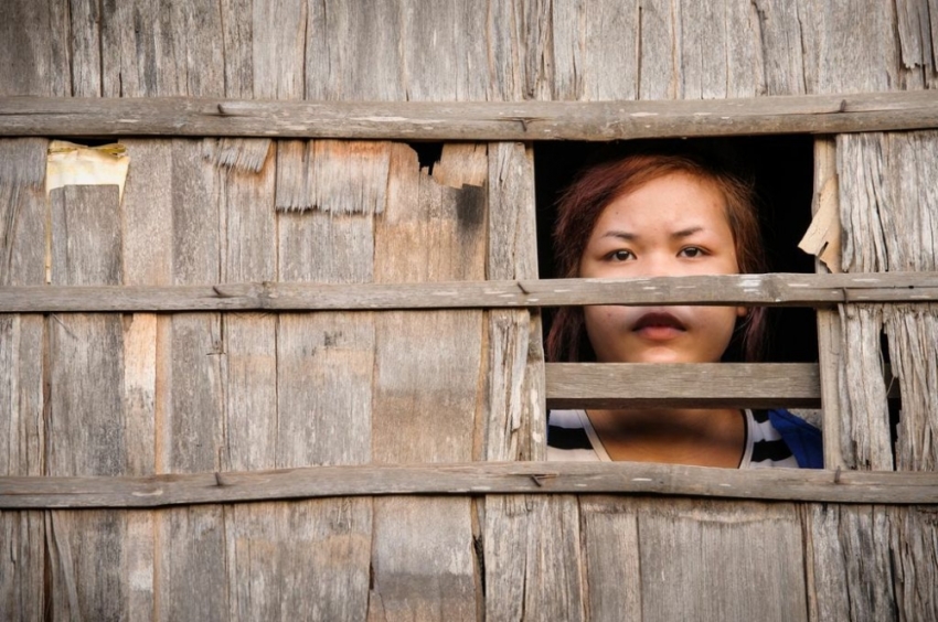 15-year-old Savoeun went to work in Leuk Daek in southeastern Cambodia. Leuk Daek is a place of rice fields and rivers, its scenery strewn with ornate pagodas that bespeak the country's Buddhist heritage. Savoeun quit school to work at the sewing factory when she was 12. Back then, she rode a bicycle to work. But on this day, the teenager took a motortaxi, her hands clutching a small bag containing the items she had been instructed to bring: her clothes and her sister's birth certificate. That, she'd had to steal. At the factory that morning, Savoeun's sister Simean was the first to notice. 