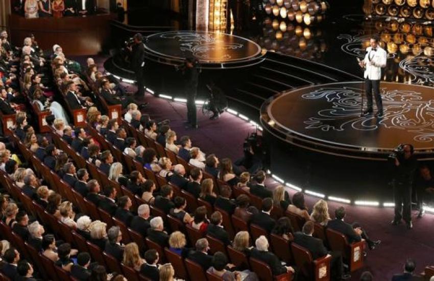 Matthew McConaughey accepts the Oscar for best actor for his role in "Dallas Buyers Club" at the 86th Academy Awards in Hollywood, California March 2, 2014.