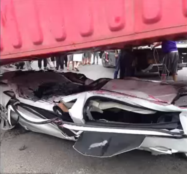 Car crushed in China