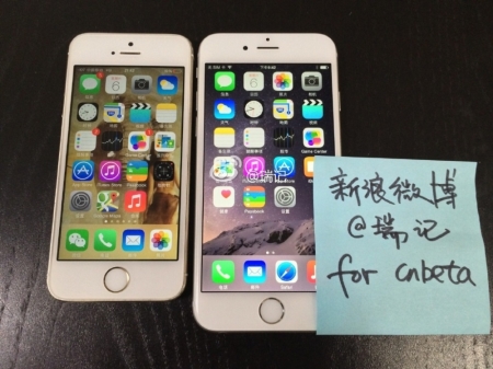 Reviewer holds a purported iPhone 6 handset in a video