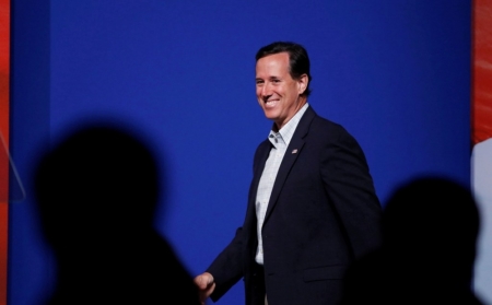 Former U.S. Sen. Rick Santorum, R-Pa., walks in to speak during the second day at the 5th annual Faith & Freedom Coalition's