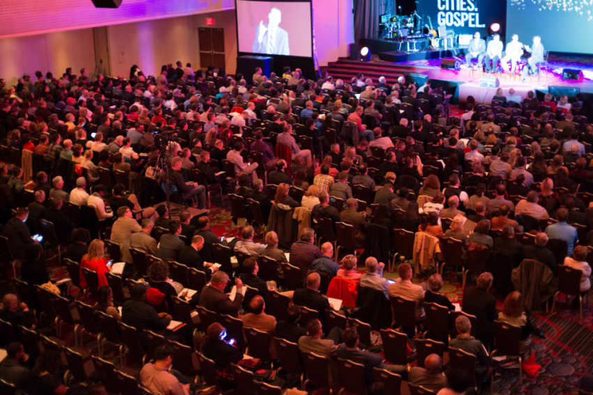 Speakers appear on stage during a panel discussion at the Movement Day, a Christian conference held on Thursday, Oct. 23, 2014, at The New York Marriott Marquis Hotel in New York City.
