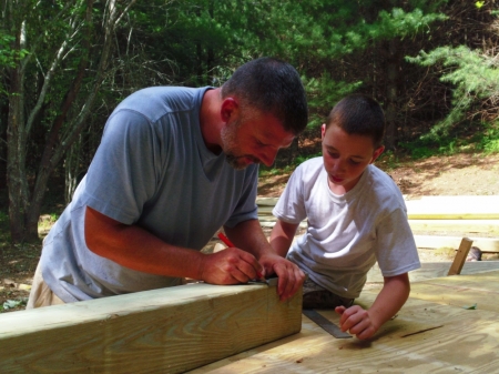"Risk it All" stars Ben and David Kemp working on their deck.