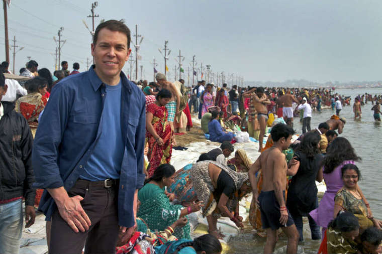 Bruce Feiler, host of "Sacred Journeys," stands at the Ganges River in India.