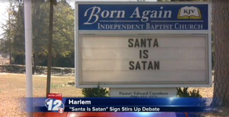 Born Again Independent Baptist Church of Harlem, Georgia places a message on their church sign reading "Santa is Satan" for the 2014 Christmas season.
