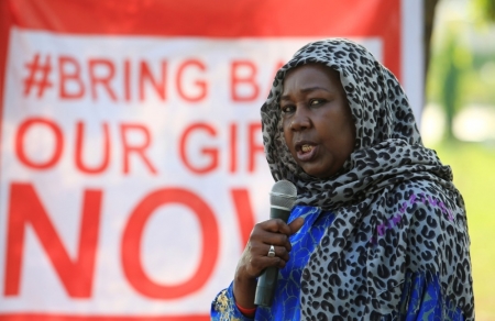 A campaigner from "#Bring Back Our Girls" addresses a rally calling for the release of the Abuja school girls who were abducted by Boko Haram militants, in Abuja, November 1, 2014. A man claiming to be Boko Haram leader Abubakar Shekau has said more than 200 girls kidnapped by the group six months ago were "married off" to its fighters, contradicting Nigerian government claims they would soon be freed.