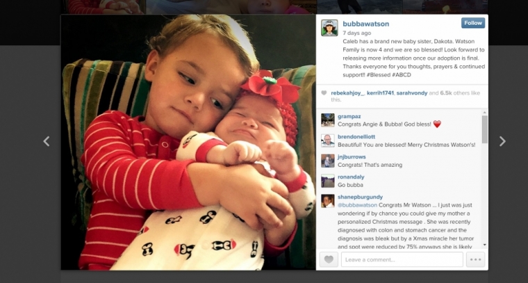 Bubba Watson son Caleb poses with baby Dakota. Watson and Wife Angie adopted Caleb in 2012 following a failed adoption that fell through at the last moment.