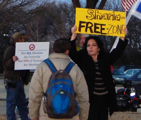 Protesters rally outside the