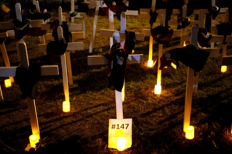 Wooden crosses are placed on the ground, symbolizing the people killed during an attack by gunmen at the Garissa University College, at the