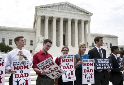 Protesters opposed to gay marriage rally in front of the Supreme Court in Washington, June 25, 2015. A decision in Obergefell v. Hodges, a test of a constitutional right to same-sex marriage, is expected in the coming days.