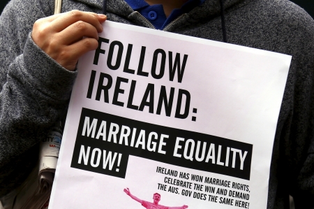 A gay rights activist holds a placard during a rally supporting same-sex marriage, in Sydney, Australia, May 31, 2015. Bill Shorten, leader of Australia's opposition Labour Party introduced a bill to legalise same-sex marriage on June 1, 2015, adding the backing of a major party to growing public support for the issue after last month's landmark 