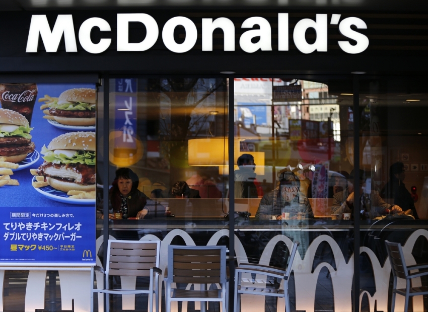 Visitors are seen inside a McDonald's store in Tokyo January 7, 2015. McDonald's Japan apologised to customers on Wednesday after foreign objects were found in its food and said it was taking various steps to supervise manufacturing and its stores to ensure there are no recurrences.