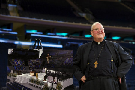 Archbishop of New York Cardinal Timothy M. Dolan waits to speak about the chair that will be used in for Pope Francis' Sept. 25 Papal Mass at Madison Square Garden in New York City Sept. 2, 2015.