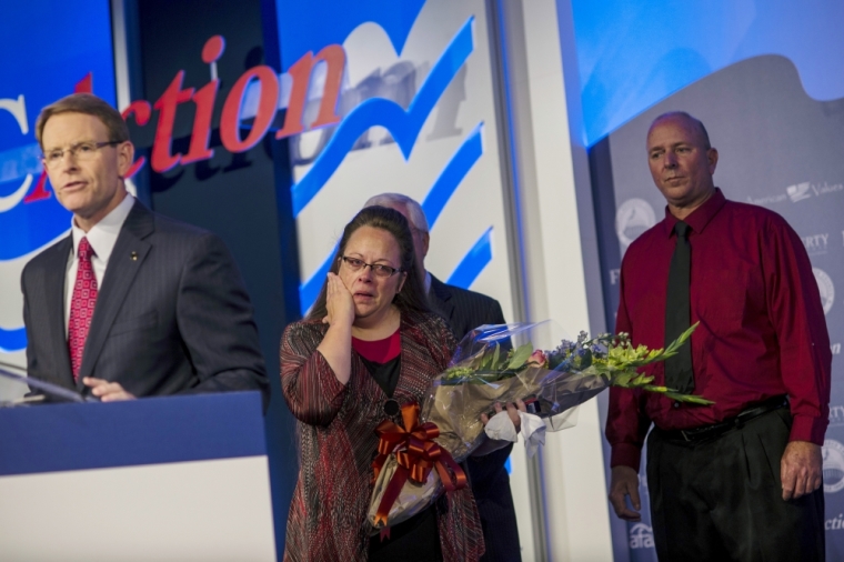 Kentucky's Rowan County Clerk Kim Davis, who was briefly jailed for refusing to issue marriage licenses to same-sex couples, receives the