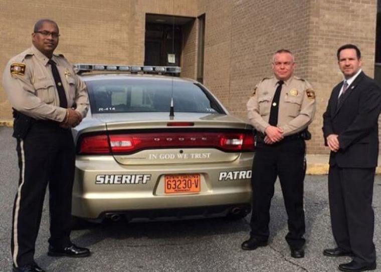 Lt. Leon Godlock, Lt Warren Sprouse, Sheriff Chris Francis.