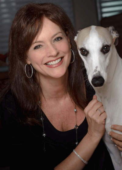 Jennifer Wilder Morgan poses with her dog in promotional photo for "Come to the Garden", 2016.