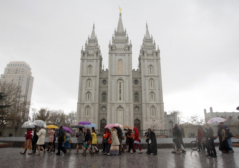 A group of Mormon women walk to Temple Square in an attempt to get tickets to the priesthood meeting at The Church of Jesus Christ of Latter-day Saints semi-annual gathering known as general conference in Salt Lake City, Utah April 5, 2014. | (Photo: Reuters/Jim Urquhart)