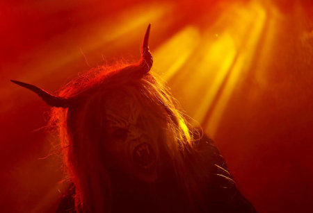 A man dressed as a devil performs during a Krampus show in the southern Bohemian town of Kaplice, December 12, 2015.