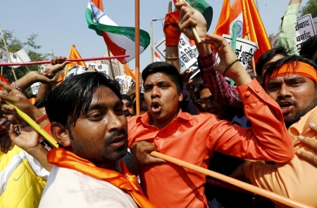 Activists from the Akhil Bharatiya Vidyarthi Parishad (ABVP), the student wing of India’s ruling Bharatiya Janata Party (BJP), shout slogans during a protest march in New Delhi, India, February 24, 2016. Thousands of ABVP members on Wednesday carried out the march against "anti-national sloganeering" raised at the Jawaharlal Nehru University (JNU) campus earlier this month, protesters said.