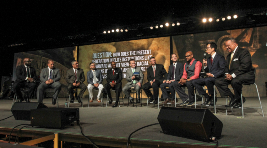 Ronnie Floyd, outgoing president of the Southern Baptist Convention, leads the panel discussion "A National Conversation on Racial Unity in America" during the annual meeting of the SBC in St. Louis Tuesday, June 14.