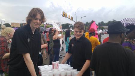 The owner and employees of a Johnson City, Tennessee Chick-fil-A restaurant serve lemonade to Black Lives Matter protesters and their opposition outside of the restaurant. July 16, 2016.