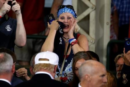 A supporter calls to Republican nominee Donald Trump as he works the rope line after speaking at