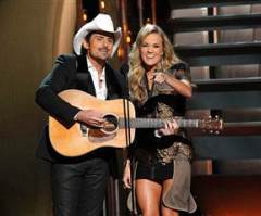 CMA Awards 2013: Obamacare Mocked by Hosts Carrie Underwood, Brad Paisley