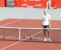 See the Hilarious Way the Loser of This Tennis Match Congratulated the Much Taller Winner