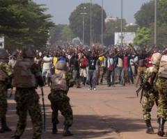 Burkina Faso Dissolve Government After Protesters Angry at President's 27-Year-Rule Torch Parliament Buildings