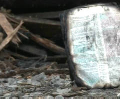 Couple Praises God After Finding Bible After House Fire