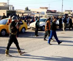 ISIS Throws Man Off Roof for Being Gay, Fanatic Mob Pelts Corpse With Rocks
