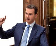 Trump Warns Assad Will 'Pay Heavy Price' If He's Plotting Chemical Weapons Attack in Syria