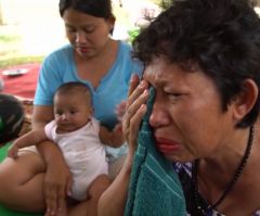 Indonesia Death Toll Passes 1,500: Body Bags Line Roads, Smell 'Almost Unbearable'