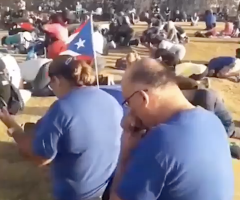 Puerto Ricans gather in prayer as hundreds of thousands protest gov't corruption