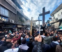 Christians protest in Syria after giant Christmas tree was set ablaze