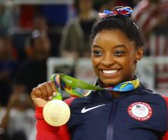 Simone Biles apologizes for making things 'personal' in social media spat with Riley Gaines 
