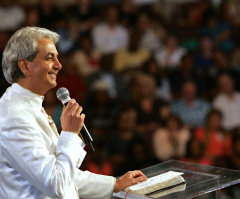 Court requires bank to seize assets from Benny Hinn Ministries after failure to pay marketing company