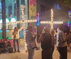 Street evangelist team assaulted by pedestrians in rainbow-painted sidewalk outside lesbian bar