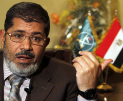 Egypt's Islamist President Backs Syrian Calls to Punish al-Assad
