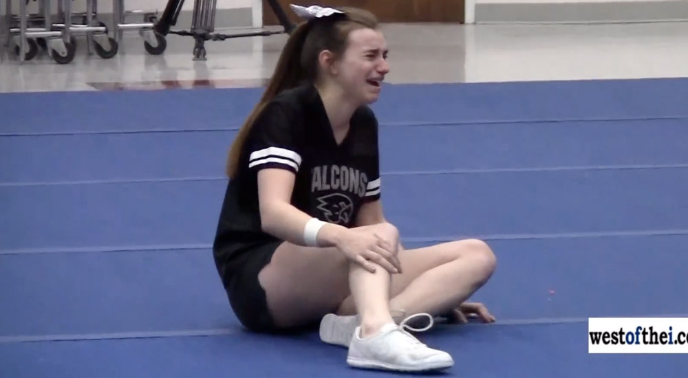 Cheerleader Breaks Down During Surprise Reunion With Navy Father Gone a