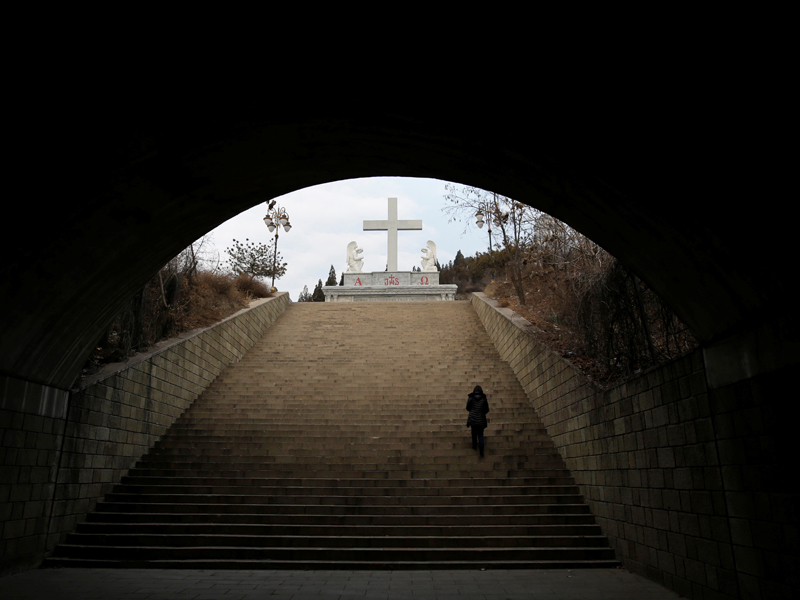 Chinese textbook rewrites Bible, claims Jesus stoned woman to death