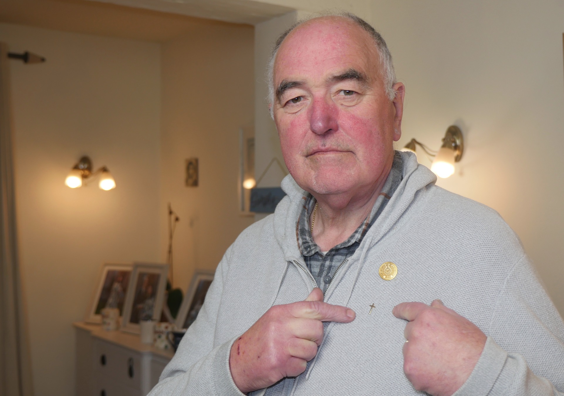 Charity apologizes to chaplain rebuked for wearing cross - Vimarsana News