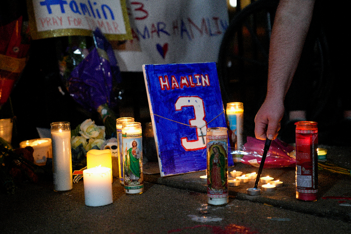 Buffalo Bills fans hold prayer vigils for Damar Hamlin with NFL star in  critical condition after cardiac arrest