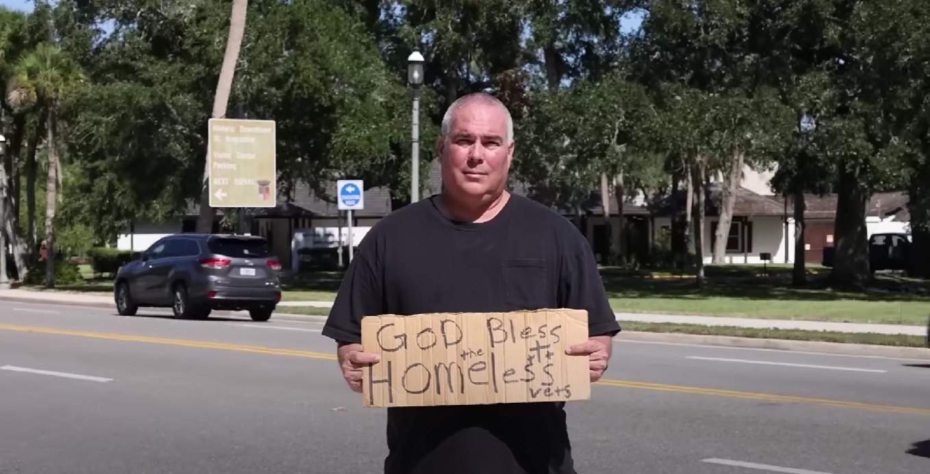 Man arrested for holding 'God bless homeless vets' sign sues city - Vimarsana News