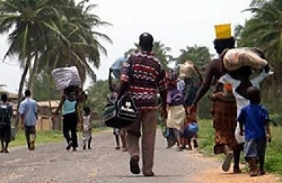 Togo's opposition said on Friday it was ready to hold talks with international mediators to try to end a crisis in which it said around 100 people had been killed following the election victory of the late ruler's son. In this file photo, Togolese fleeing