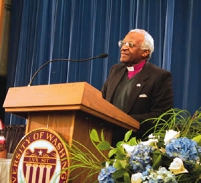 Archbishop Desmond Tutu, winner of the 1984 Nobel Peace Prize, speaks during a visit to the University of Washington in this May 7, 2002 file photo. Tutu described the furor over the Prophet Muhammad drawings as the ''symptom of a more serious disease.''