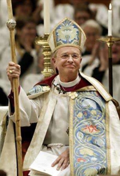 The openly gay bishop Gene Robinson sits on his flambloyant throne as he takes hold of the entire New Hampshire diocese, Sunday, March 7, 2004.