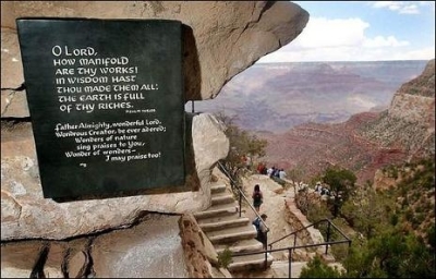 A bronze plaque depicting Bible verses is posted by Lookout Studio at Grand Canyon National Park near Flagstaff, Ariz. Debate over religious displays in public places has extended into national parks.