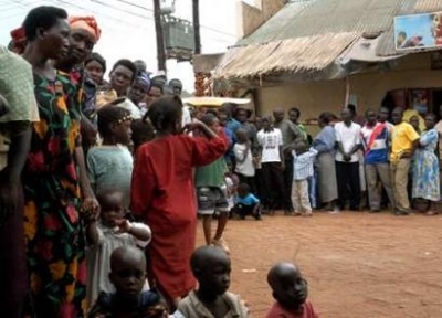 Ugandans wait in line for free voluntary HIV /AIDS tests in the Ugandan capital Kampala in this picture taken on September 25, 2004. HIV/AIDS is ravaging remote districts of northern Uganda already suffering from an 18-year-old civil war that caused one o