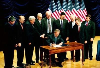 President Bush signs the Partial-birth Abortion Ban Act of 2003 Nov. 5 at the Ronald Reagan Building in Washington. Photo by Tina Hager/White House